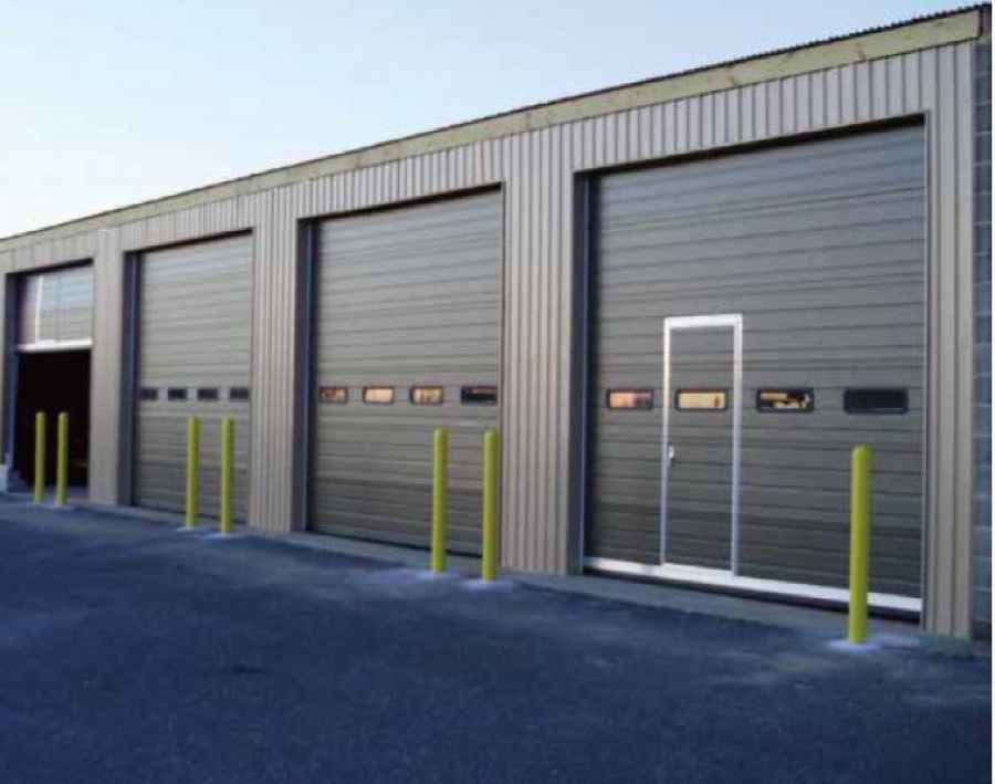 Industrial sectional door for warehouses